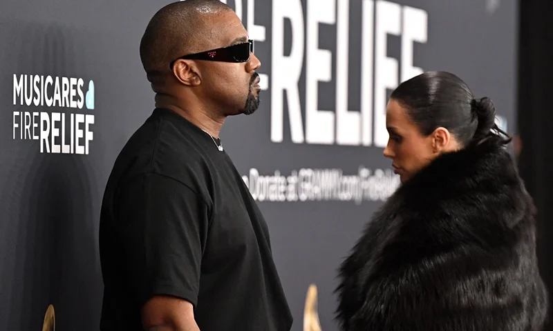 US rapper and producer Kanye West (L) and Australian model Bianca Censori arrive for the 67th Annual Grammy Awards at the Crypto.com Arena in Los Angeles on February 2, 2025. (Photo by Robyn Beck / AFP) / RESTRICTED TO EDITORIAL USE (Photo by ROBYN BECK/AFP via Getty Images)