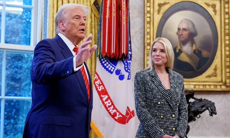 WASHINGTON, DC - FEBRUARY 5: U.S. President Donald Trump, accompanied by newly sworn-in U.S. Attorney General Pam Bondi, speaks to member of the media in the Oval Office at the White House on February 05, 2025 in Washington, DC. The Senate confirmed Bondi as Attorney General with a 54-46 vote on Tuesday. (Photo by Andrew Harnik/Getty Images)