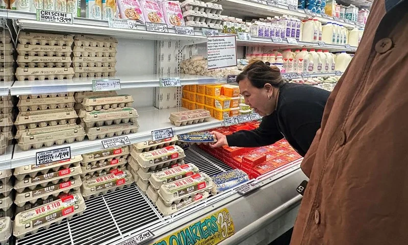 A shopper reaches for a carton of eggs from a grocery chain store asking customers to limit their purchases on February 10, 2025 in South Pasadena, California. A resurgence of avian flu, which first struck the United States in 2022, is hitting chicken farms hard, sending egg prices soaring and rattling consumers accustomed to buying this dietary staple for only a few dollars. (Photo by Frederic J. BROWN / AFP) (Photo by FREDERIC J. BROWN/AFP via Getty Images)