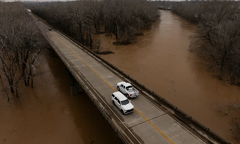 In this aerial view, the Barren River floods around Kentucky Route 185 on February 16, 2025 in Bowling Green, Kentucky. Severe winter storms brought torrential rains causing intense flooding in Kentucky and parts of Florida and Georgia. (Photo by Brett Carlsen/Getty Images)