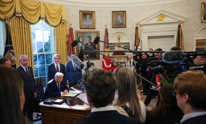 WASHINGTON, DC - FEBRUARY 14: U.S. President Donald Trump speaks to the media after signing an executive in the Oval Office at the White House on February 14, 2025 in Washington, DC. President Trump signed a series of executive orders including announcing that his administration will withhold federal funding from schools and universities that impose COVID-19 vaccine mandates. (Photo by Kayla Bartkowski/Getty Images)