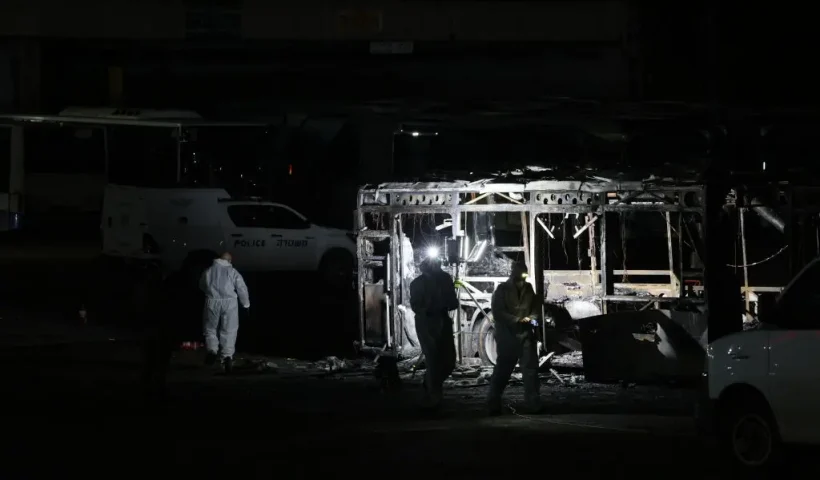 Security forces and bomb disposal units are deployed to the scene of a bus explosion in Bat Yam on February 20, 2025. Israeli police said that bombs on three buses exploded in the central city of Bat Yam on February 20, 2025 evening, with a local official saying there were no injuries. Defence Minister Israel Katz accused "Palestinian terrorist organisations" of carrying out the blasts, while Prime Minister Benjamin Netanyahu was set to hold a security meeting. (Photo by OREN ZIV / AFP) (Photo by OREN ZIV/AFP via Getty Images)