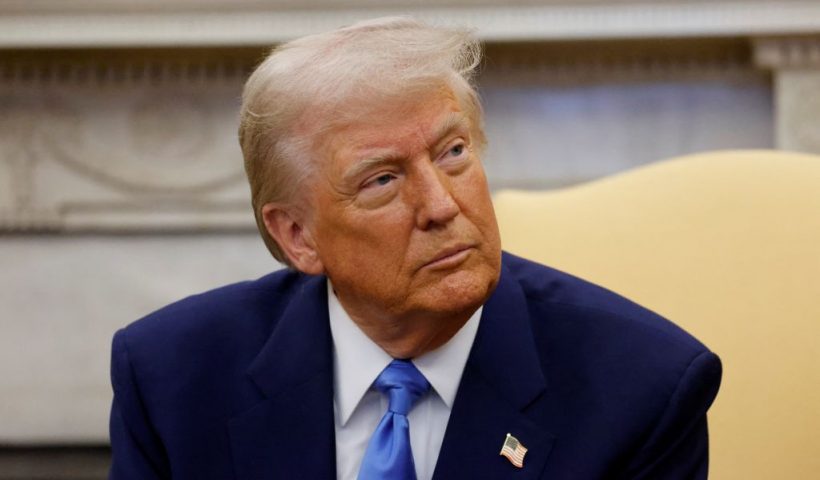 US President Donald Trump meets with French President Emmanuel Macron (out of frame) in the Oval Office of the White House in Washington, DC, on February 24, 2025. (Photo by Ludovic MARIN / POOL / AFP) (Photo by LUDOVIC MARIN/POOL/AFP via Getty Images)