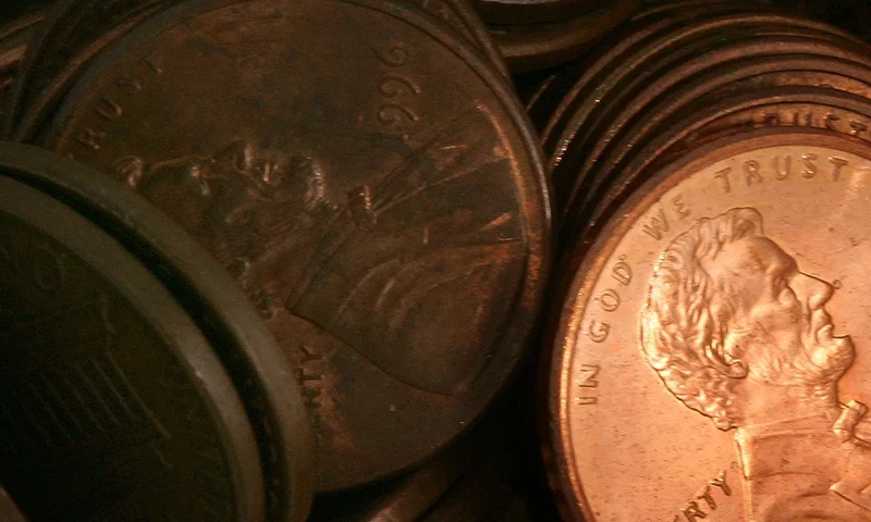 DES PLAINES, IL - JULY 06: Pennies lay in a pile July 6, 2006 in Des Plaines, Illinois. According to the U.S. Mint says a penny costs more to make than it's worth, 1.2 cents, prompting some to call for its demise. (Photo Illustration by Tim Boyle/Getty Images)