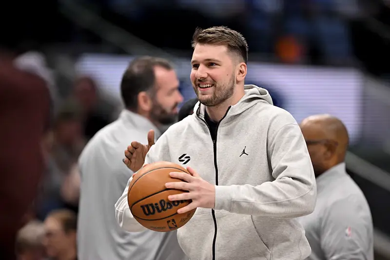 Dallas Mavericks guard Luka Doncic (77) looks on during a stoppage in play during the first half of the game between the Dallas Mavericks and the Minnesota Timberwolves at the American Airlines Center. Mandatory Credit: Jerome Miron-Imagn Images/File Phot