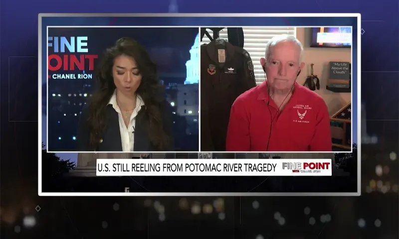 Video still from Fine Point on One America News Network showing a split screen of the host on the left side, and on the right side is the guest, Lieutenant Colonel Allen "Bullit" Campbell.