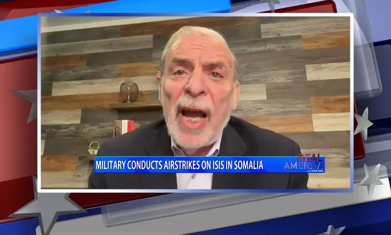 Video still from Real America on One America News Network during an interview with the guest, Dov Hikind.