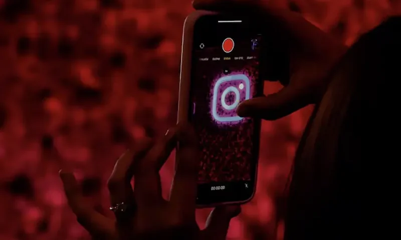 A logo of mobile application Instagram is seen on a mobile phone, during a conference in Mumbai, India, September 20, 2023. REUTERS/Francis Mascarenhas/File Photo