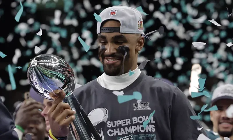 Philadelphia Eagles' Jalen Hurts celebrates with the Vince Lombardi Trophy after winning Super Bowl LIX REUTERS/Mike Segar