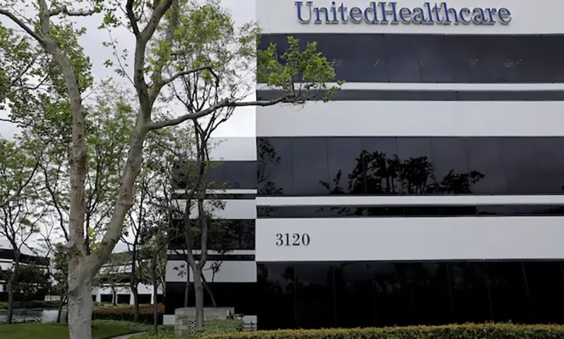 The corporate logo of the UnitedHealth Group appears on the side of one of their office buildings in Santa Ana, California, U.S., April 13, 2020. REUTERS/Mike Blake/File Photo