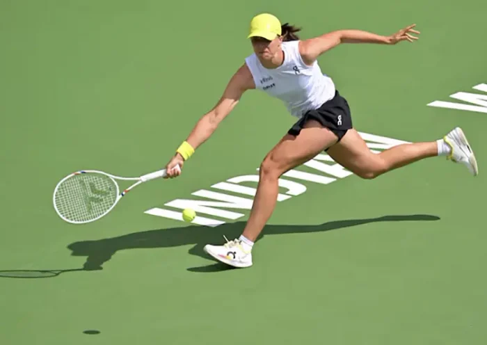 Iga Swiatek (POL) hits a shot as she defeated Karolina Muchova (not pictured) during her fourth round match in the BNP Paribas Open the at Indian Well Tennis Garden. Mandatory Credit: Jayne Kamin-Oncea-Imagn Images/File Photo