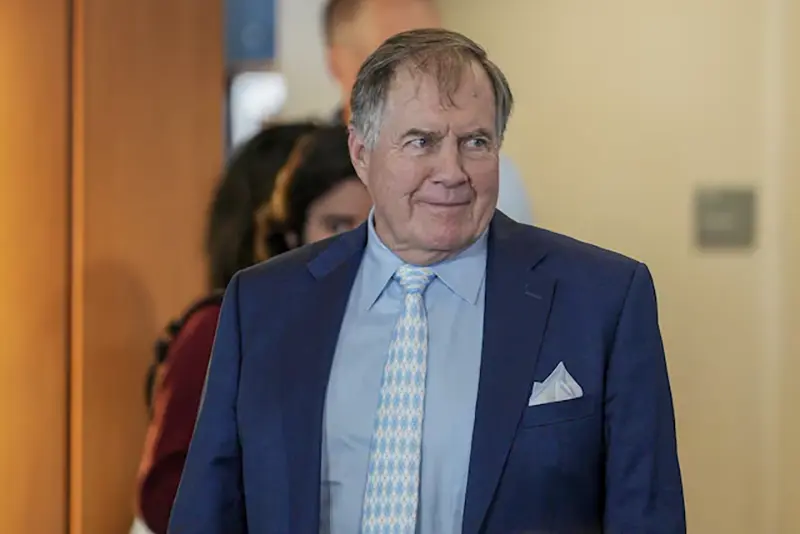 North Carolina Tar Heels new head coach Bill Belichick walks to his seat for the announcement of his hiring at Loudermilk Center for Excellence. Mandatory Credit: Jim Dedmon-Imagn Images/ File Photo