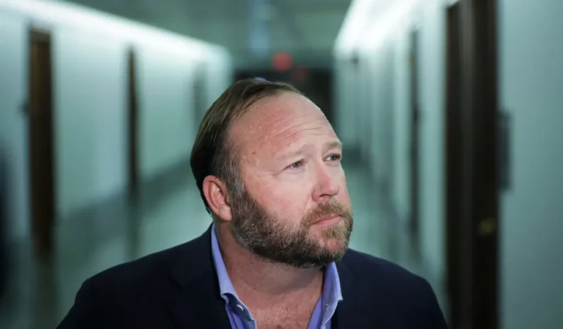 WASHINGTON, DC - SEPTEMBER 5: Alex Jones of InfoWars talks to reporters outside a Senate Intelligence Committee hearing concerning foreign influence operations' use of social media platforms, on Capitol Hill, September 5, 2018 in Washington, DC. Twitter CEO Jack Dorsey and Facebook chief operating officer Sheryl Sandberg faced questions about how foreign operatives use their platforms in attempts to influence and manipulate public opinion. (Photo by Drew Angerer/Getty Images)