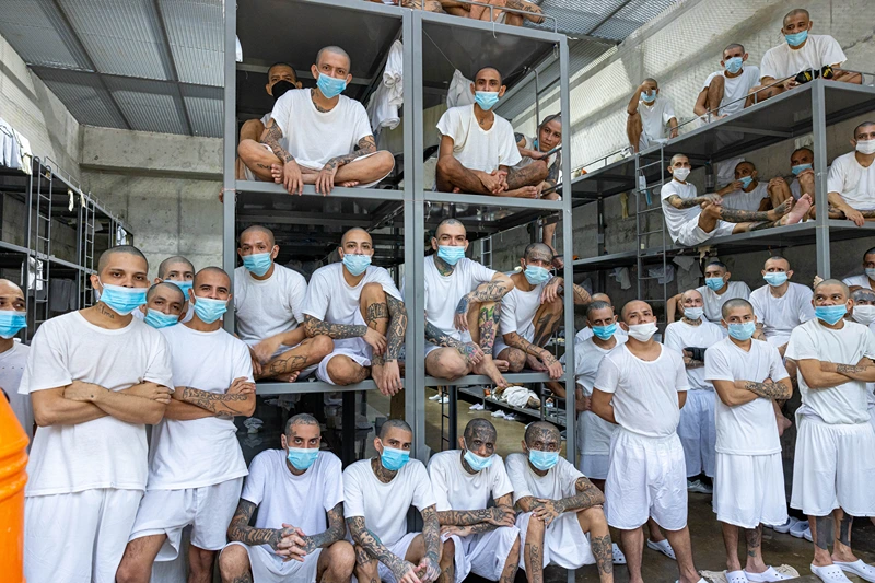 TECOLUCA, EL SALVADOR - AUGUST 21: In this handout picture provided by the Salvadoran presidency Inmates remain at their cell during a humanitarian visit to counter-terrorism confinement center CECOT (SPANISH: Centro de Confinamiento del Terrorismo) on August 21, 2023 in Tecoluca, El Salvador. The visit was led by Presidential Commissioner for Human Rights and Freedom of Expression, Andrés Guzman Caballero. (Photo by Handout/Getty Images)