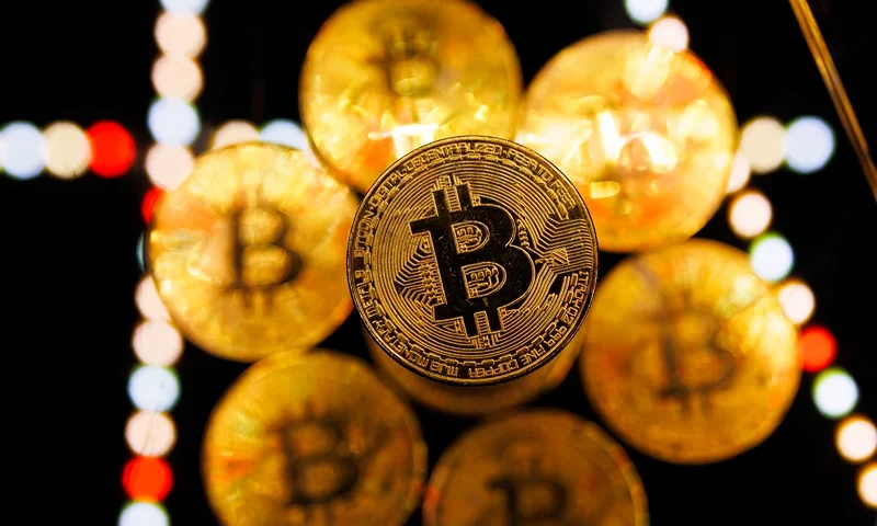 LONDON, ENGLAND - JANUARY 09: In this photo illustration, a visual representation of the digital Cryptocurrency, Bitcoin is seen on January 09, 2024 in London, England. Bitcoin investors are expecting the U.S. Securities And Exchange Commission (SEC) to issue a decision soon on whether to grant Bitcoin "exchange-traded fund" (ETF) approval, which would allow people to invest in Bitcoin without having to buy it on a crypto exchange like Coinbase or Binance. The price of Bitcoin has risen in anticipation of such approval. (Photo illustration by Dan Kitwood/Getty Images)