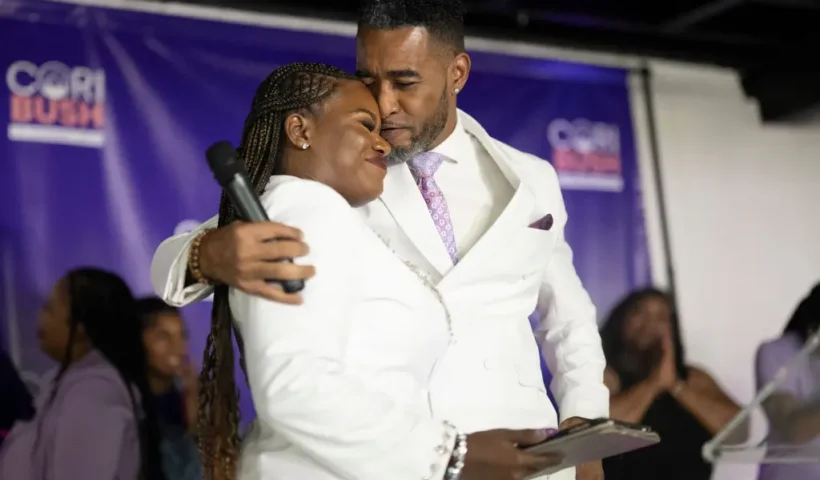 ST LOUIS, MISSOURI - AUGUST 6: U.S. Rep. Cori Bush (D-MO) kisses husband Cortney Marritts prior to delivering her concession speech during a primary election watch party at Chevre Events on August 6, 2024 in St Louis, Missouri. Bush lost Tuesday's Democratic primary to St. Louis County Prosecutor Wesley Bell. (Photo by Michael B. Thomas/Getty Images)
