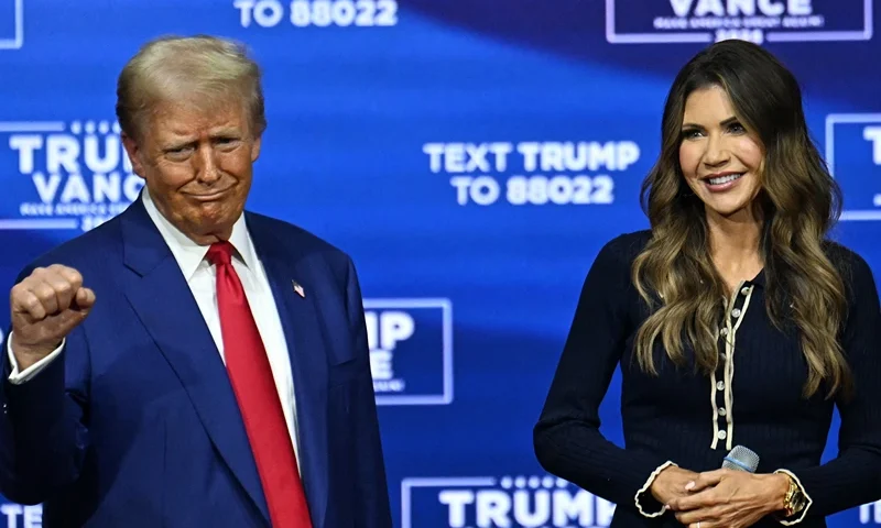 Former US President and Republican presidential candidate Donald Trump attends a town hall, moderated by South Dakota Governor Kristi Noem, at the Greater Philadelphia Expo Center and Fairgrounds in Oaks, Pennsylvania, on October 14, 2024. (Photo by Jim WATSON / AFP) (Photo by JIM WATSON/AFP via Getty Images)