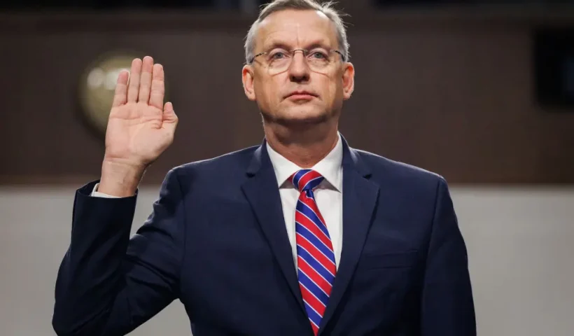 WASHINGTON, DC - JANUARY 21: Doug Collins, U.S. President Donald Trump's nominee to be the Secretary of the Department of Veterans Affairs, is sworn in during his Senate Veterans' Affairs Committee confirmation hearing in the Dirksen Senate Office Building on January 21, 2025 in Washington, DC. Collins, a former U.S. Representative and veteran of the Iraq War, has strong bipartisan support and is not expected to face a difficult confirmation. (Photo by Samuel Corum/Getty Images)