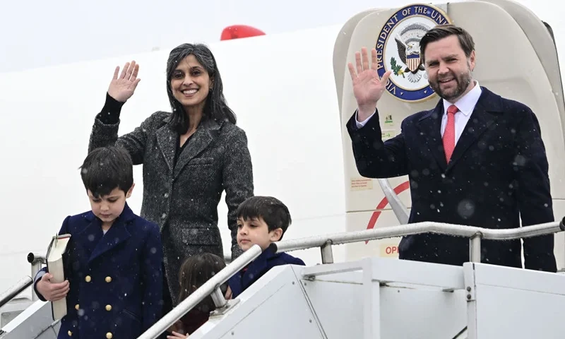 US Vice President JD Vance and his wife Usha Vance wave upon landing at Munich international airport, southern Germany, on February 13, 2025, one day before the start of the Munich Security Conference (MSC). The Munich Security Conference (MSC) is officially launced on February 14, 2025 and runs until February 16, 2025 (Photo by Tobias SCHWARZ / AFP) / ALTERNATE CROP (Photo by TOBIAS SCHWARZ/AFP via Getty Images)