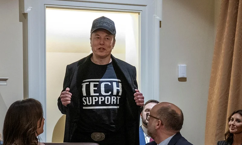 Leader of the Department of Government Efficiency Elon Musk wears a shirt that says "Tech Support" as he speaks during the first cabinet meeting of US President Donald Trump's second term in the Cabinet Room at the White House in Washington, DC, on February 26, 2025. (Photo by JIM WATSON/AFP via Getty Images)