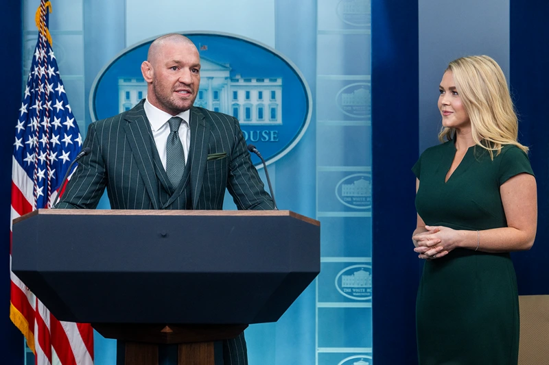 Irish professional mixed martial artist and businessman Conor McGregor (L) speaks from the White House briefing room podium with White House Press Secretary Karoline Leavitt (R) in Washington, DC, on March 17, 2025. (Photo by Jim WATSON / AFP) (Photo by JIM WATSON/AFP via Getty Images)