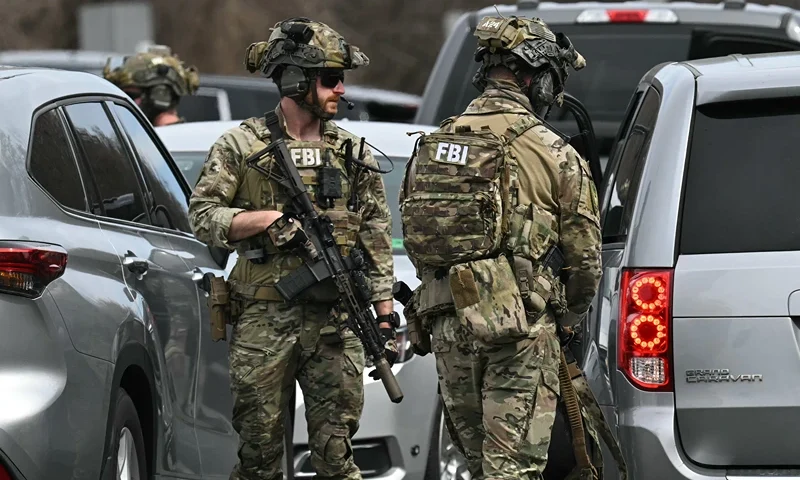 Members of law enforcement respond to reports of an armed individual near the Central Intelligence Agency (CIA) headquarters on March 19, 2025 in Langley, Virginia. The CIA is reportedly on lockdown as a SWAT team and other agencies respond. (Photo by SAUL LOEB / AFP) (Photo by SAUL LOEB/AFP via Getty Images)