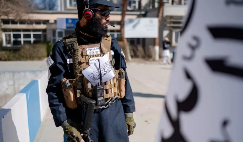 A Taliban security personnel stands guard during the ceremony held to mark the start of new academic year at Amani High School in Kabul on March 20, 2025. (Photo by Wakil KOHSAR / AFP) (Photo by WAKIL KOHSAR/AFP via Getty Images)