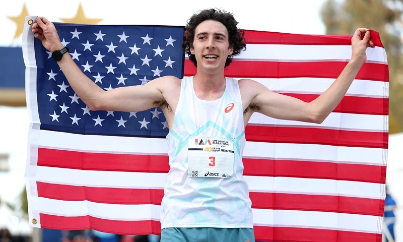 : Matt Richtman of the United States celebrates after crossing the finish line and winning the 2025 Los Angeles Marathon at Westfield Century City on March 16, 2025 in Los Angeles, California. (Photo by Luke Hales/Getty Images)