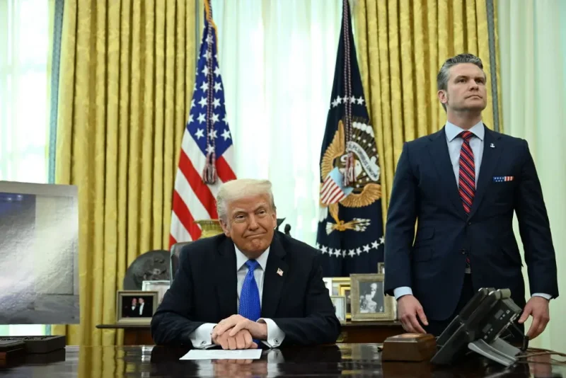 US President Donald Trump and Secretary of Defense Pete Hegseth prepare to speak to the press in the Oval Office of the White House in Washington, DC, on March 21, 2025. (Photo by Annabelle Gordon / AFP) (Photo by ANNABELLE GORDON/AFP via Getty Images)