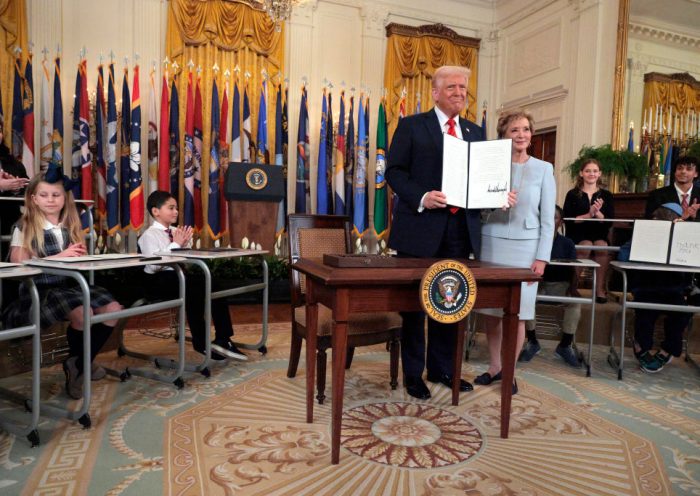 WASHINGTON, DC - MARCH 20: U.S. President Donald Trump stands with Secretary of Education Linda McMahon after signing an executive order to reduce the size and scope of the Education Department during a ceremony in the East Room of the White House on March 20, 2025 in Washington, DC. The order instructs McMahon, former head of the Small Business Administration and co-founder of the World Wrestling Entertainment, to shrink the $100 billion department, which cannot be dissolved without Congressional approval. (Photo by Chip Somodevilla/Getty Images)