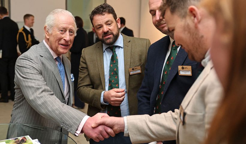 Britain's King Charles III (L) meets with farmers and their relatives during a visit of the exhibition "Soil: The World at Our Feet" at Somerset House in central London, on March 26, 2025. (Photo by Chris Jackson / POOL / AFP) (Photo by CHRIS JACKSON/POOL/AFP via Getty Images)