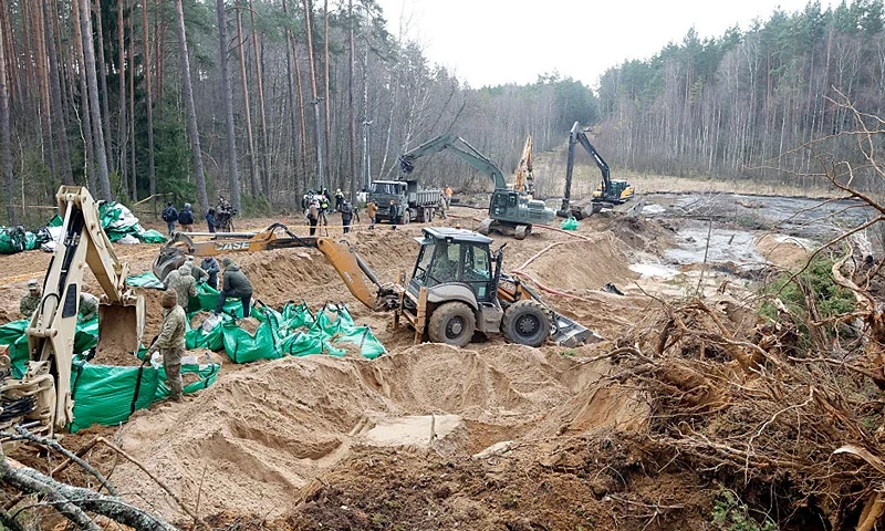 Military personnel work at the site of a rescue operation for missing US soldiers at Pabrade training ground, in Lithuania, on March 28, 2025. Lithuanian Defense Minister Dovile Sakaliene said that "all scenarios" were still being considered regarding the fate of four American soldiers who went missing during an exercise in the east of the country, stressing that their search continued under difficult conditions. (Photo by Petras Malukas / AFP) (Photo by PETRAS MALUKAS/AFP via Getty Images)