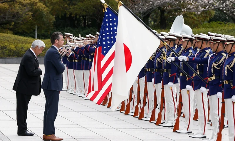 TOKYO, JAPAN - MARCH 30: Minister of Defense of Japan Gen Nakatani and U.S. Defense Secretary Pete Hegseth review an honor guard during a welcome ceremony at the Ministry of Defense on March 30, 2025 in Tokyo, Japan. U.S. Defense Secretary Pete Hegseth is visiting Japan to participate in a Japan-U.S. joint memorial ceremony on Iwo Jima (Iwoto) commemorating the 80th anniversary of World War II's end and to discuss strengthening bilateral security cooperation. (Photo by Kiyoshi Ota/Pool - Getty Images)