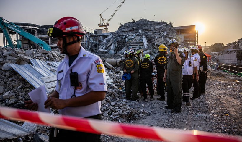 BANGKOK, THAILAND - MARCH 28: Thai rescue teams provide aid at a construction building collapse in Bangkok's Chatuchak area on March 28, 2025 in Bangkok, Thailand. A powerful 7.7 magnitude earthquake struck Myanmar on March 28, 2025, causing strong tremors that were felt in Bangkok, where buildings swayed and hundreds of people evacuated onto the streets. (Photo by Lauren DeCicca/Getty Images)