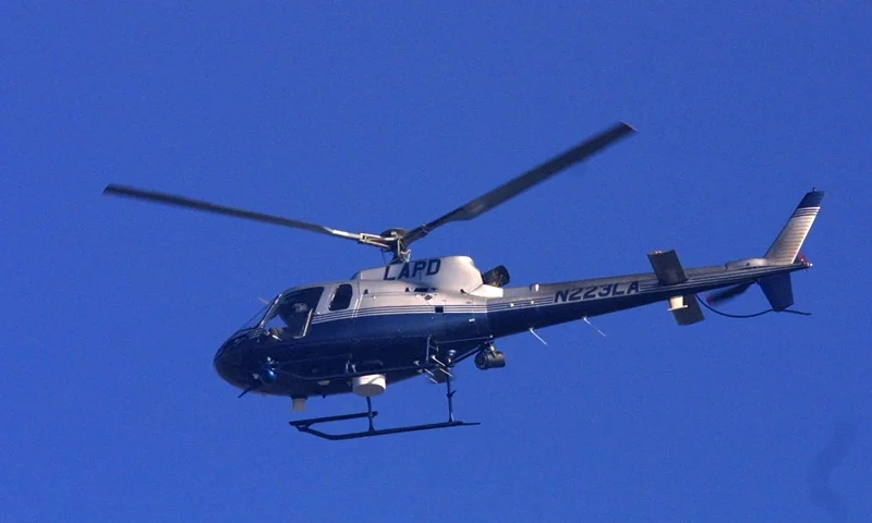 A Los Angeles Police Department helicopter hovers over the Shubert Theatre during the 53rd annual Primetime Emmy Awards November 4, 2001 in Los Angeles, CA. The awards show will take place after being postponed two times. (Photo by Jason Kirk/Getty Images)