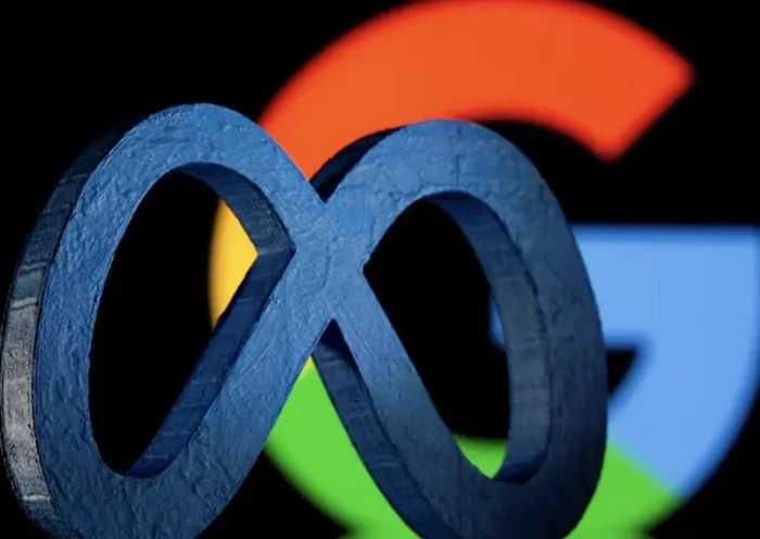 A 3D printed Facebook's new rebrand logo Meta is seen in front of displayed Google logo in this illustration taken on November 2, 2021. REUTERS/Dado Ruvic/Illustration/File Photo