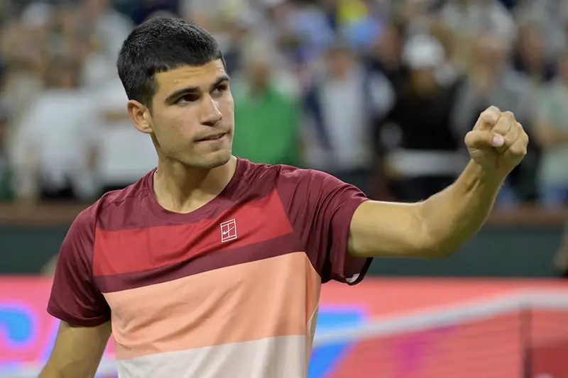 Carlos Alcaraz (ESP) celebrates after defeating Denis Shapovalov (not pictured) in his third round match at the BNP Paribas Open at the Indian Well Tennis Garden. Mandatory Credit: Jayne Kamin-Oncea-Imagn Images