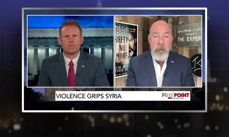 Video still from Fine Point on One America News Network showing a split screen of the host on the left side, and on the right side is the guest, Jonathan T. Gilliam.