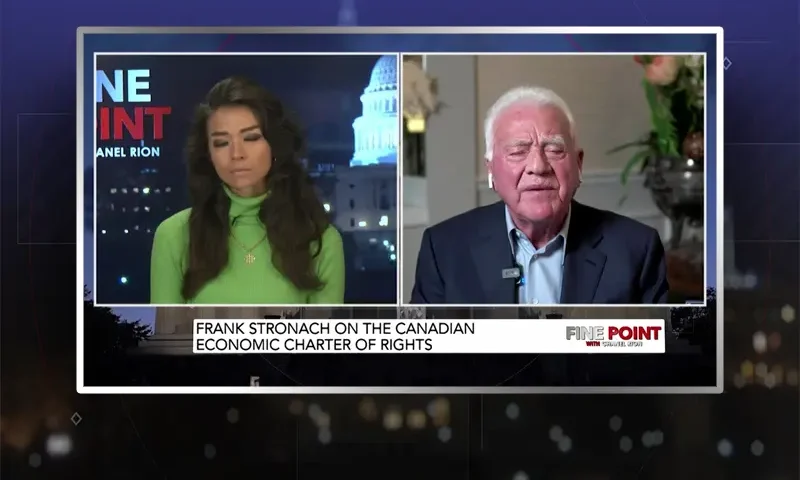 Video still from Fine Point on One America News Network showing a split screen of the host on the left side, and on the right side is the guest, Frank Stronach.