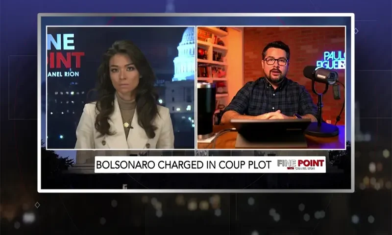 Video still from Fine Point on One America News Network showing a split screen of the host on the left side, and on the right side is the guest, Paulo Figueiredo.