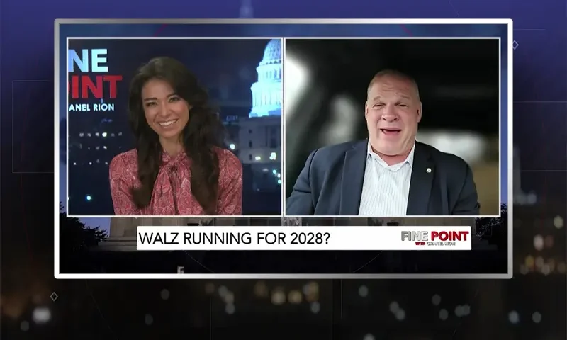 Video still from Fine Point on One America News Network showing a split screen of the host on the left side, and on the right side is the guest, Mayor Glenn Jacobs.
