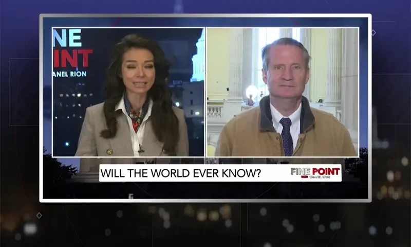 Video still from Fine Point on One America News Network showing a split screen of the host on the left side, and on the right side is the guest, Tim Burchett.