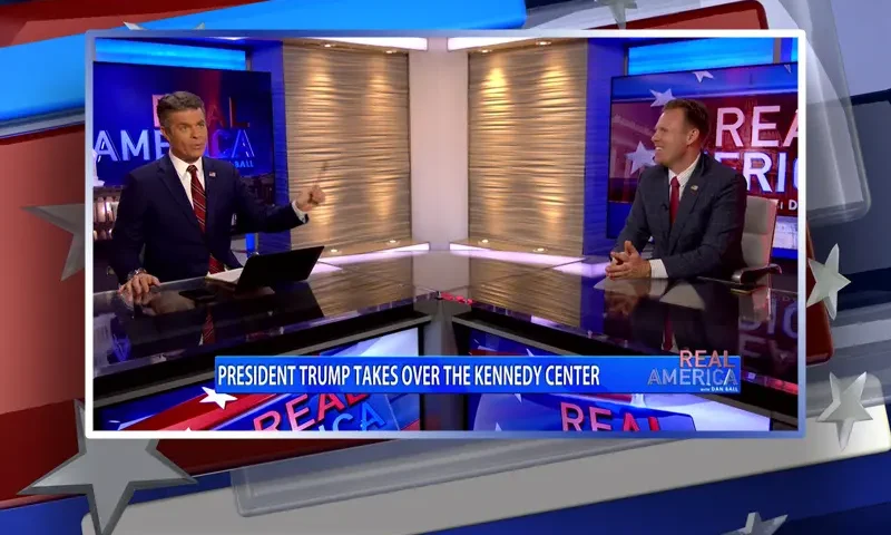 Video still from Real America on One America News Network showing the host on the left side, and on the right side is the guest, Andrew Giuliani.