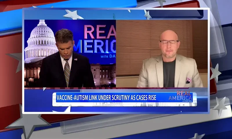 Video still from Real America on One America News Network showing a split screen of the host on the left side, and on the right side is the guest, Dr. Eric Nepute.
