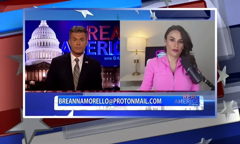 Video still from Real America on One America News Network showing a split screen of the host on the left side, and on the right side is the guest, Breanna Morello.