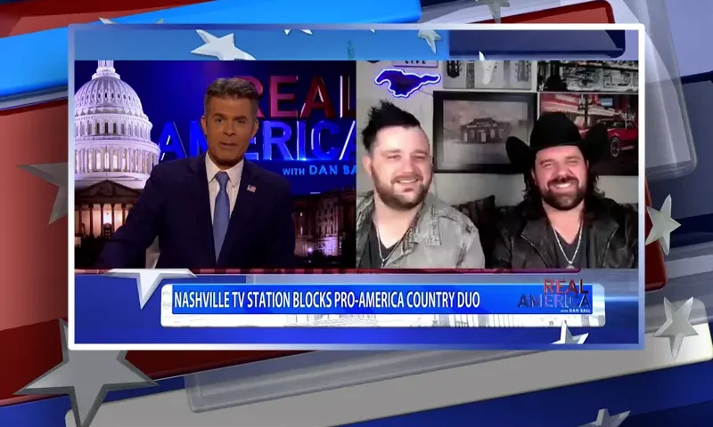 Video still from Real America on One America News Network showing a split screen of the host on the left side, and on the right side are guests Seth Dugger and Jordan Dugger.