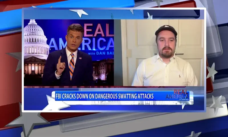 Video still from Real America on One America News Network showing a split screen of the host on the left side, and on the right side is the guest, Nick Sortor.