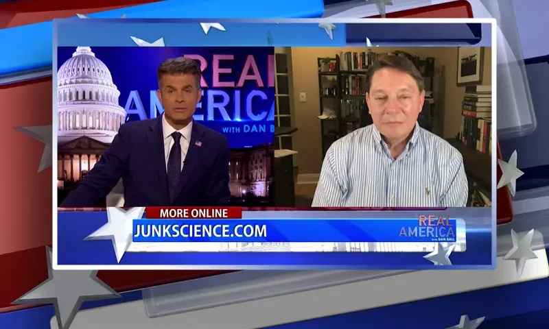 Video still from Real America on One America News Network showing a split screen of the host on the left side, and on the right side is the guest, Steve Milloy.