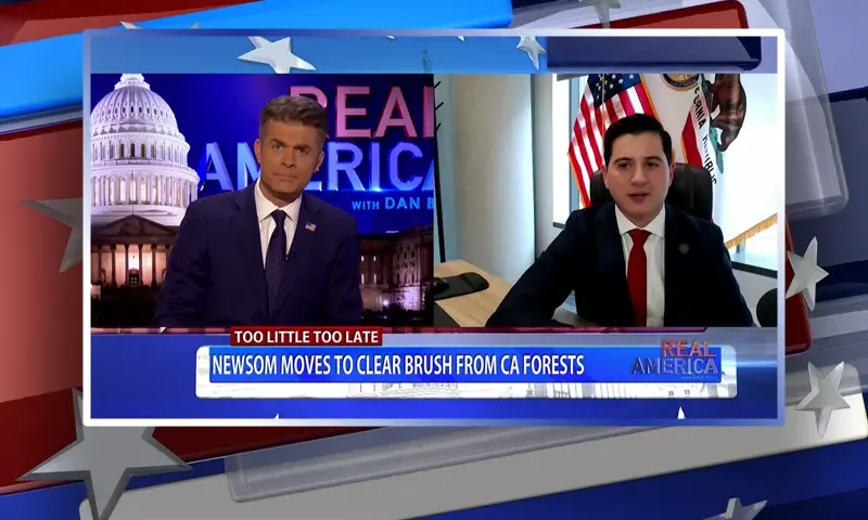 Video still from Real America on One America News Network showing a split screen of the host on the left side, and on the right side is the guest, Bill Essayli.
