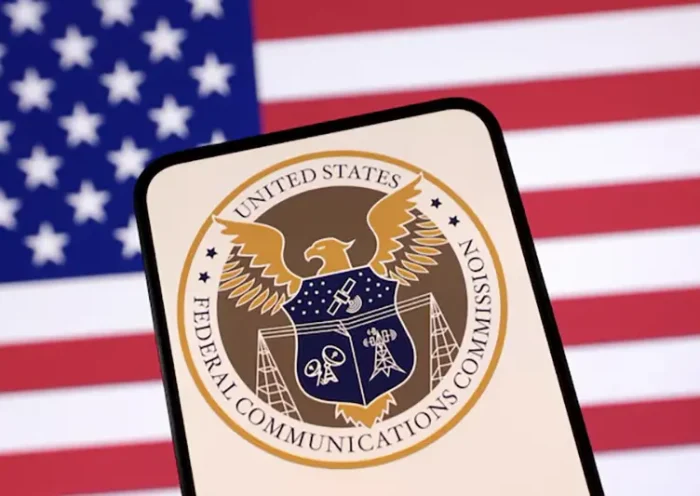 United States Federal Communications Commission logo and U.S. flag are seen in this illustration taken April 23, 2025. REUTERS/Dado Ruvic/Illustration